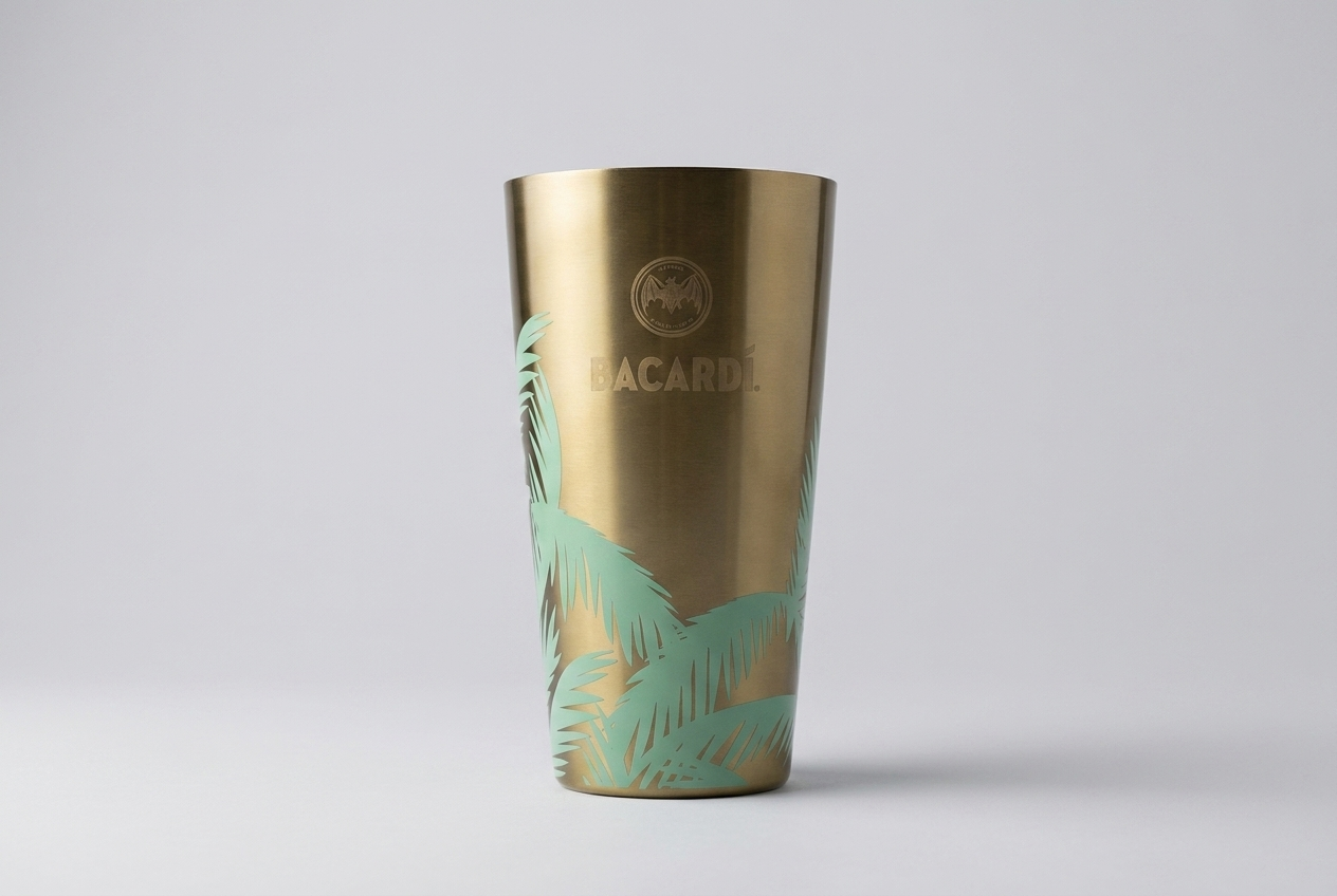 Bacardi gold tumbler with palm motif